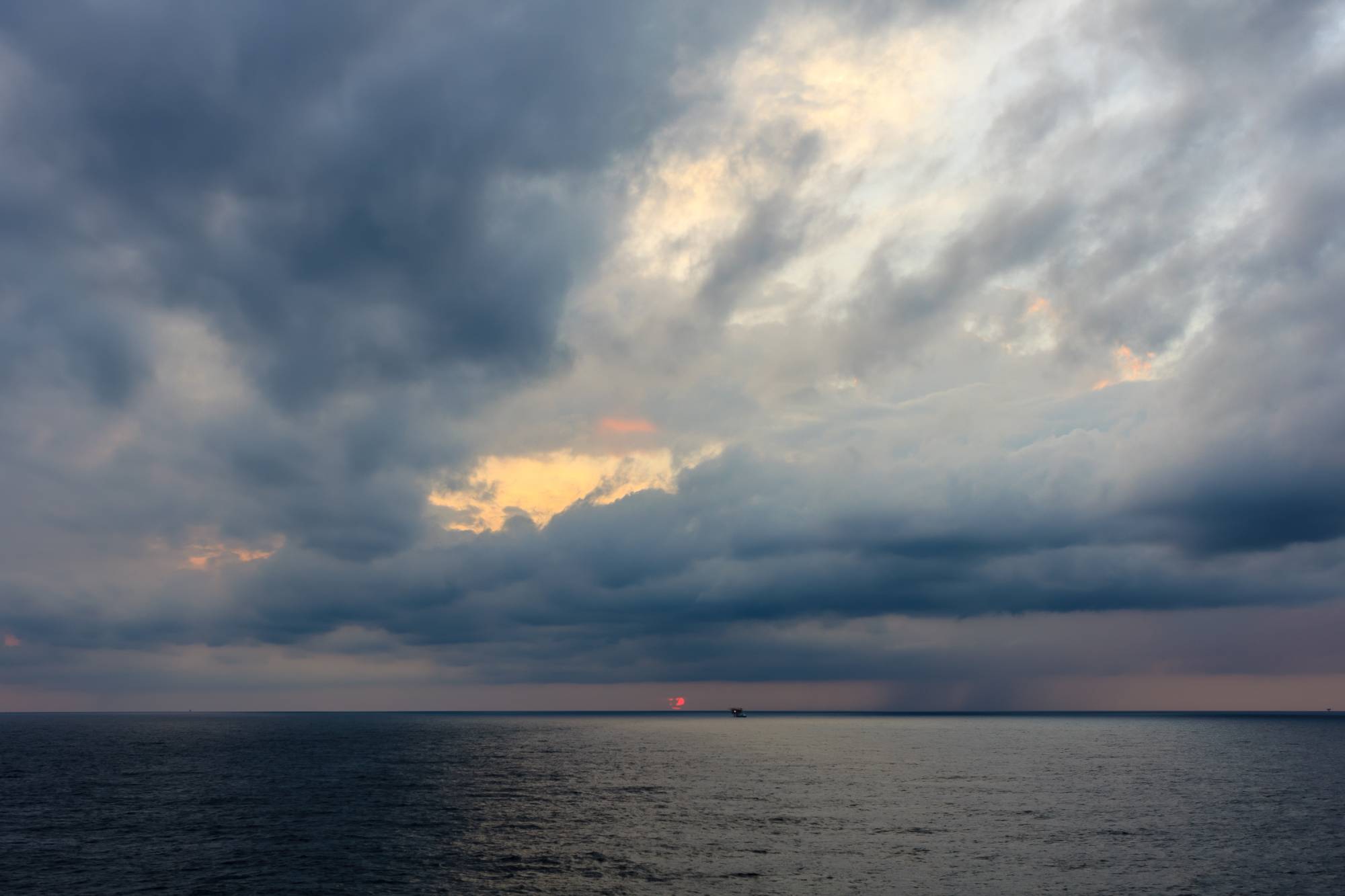 Dark & Dramatic blue sky and dark & Dramatic blue sea color and dark storm raining cloud background. Dark & Dramatic blue sky and dark & Dramatic blue sea color and dark storm raining cloud background.